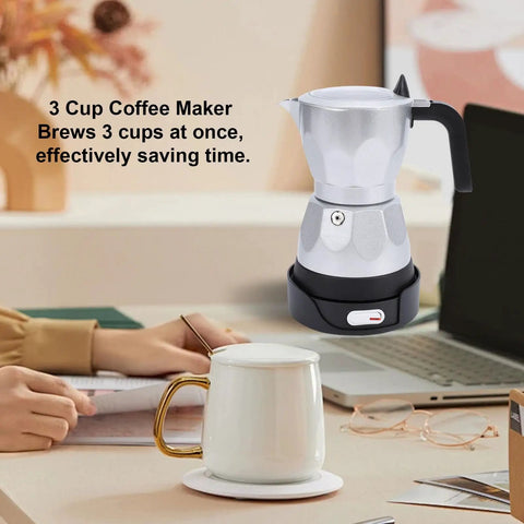 Electric Moka Pot 3 Cup Aluminum Coffee Maker With Detachable Base on a table with a mug, laptop, and notebook