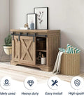 Wooden cabinet with installed 3 Ft Mini Cabinet Bypass Barn Door Hardware Kit With Single Track, decorative items on top