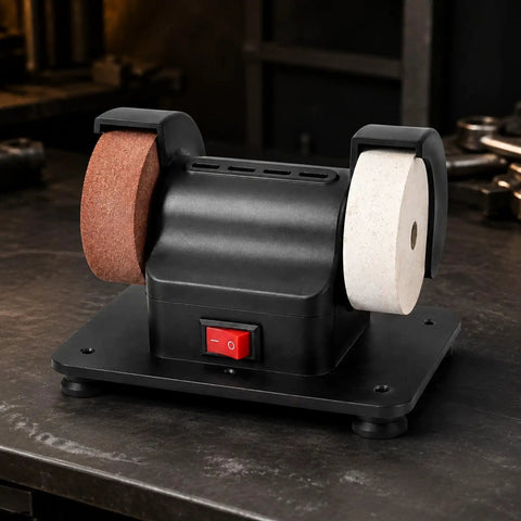 Badass Dual Wheel Bench Grinder With Sturdy Rubber Footed Base showing black benchtop machine with two abrasive wheels for garage work.