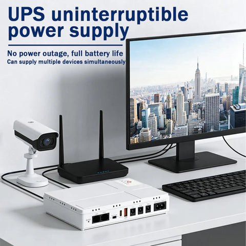 Mini UPS Backup Power Supply 8000mAh Battery Pack For Routers and Modems on desk, powering camera and router with monitor.