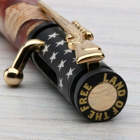 Kickin DIY Woodturning Project Kit Featuring Five Ceramic Flag Ballpoint Pen Hardware Sets And Precision Bushings For Turning Custom Writer Accessories, close-up of pen with black and gold design.