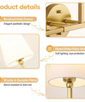 Top Tier Three Light Brushed Gold Vanity Lights With Flared White Fabric Shades Smooth Bathroom Mirror Fixture with detailed design.