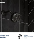 Top Shelf Matte Black Two Handle Centerset Bathroom Sink Faucet With Premium Drain Assembly For Quick Four Inch Setup Solid Flow Control mounted on black tile wall.
