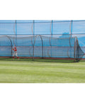 Person practicing in Xtender 24 Ft Baseball and Softball Batting Cage With Durable Fiberglass Frame and Polyester Netting