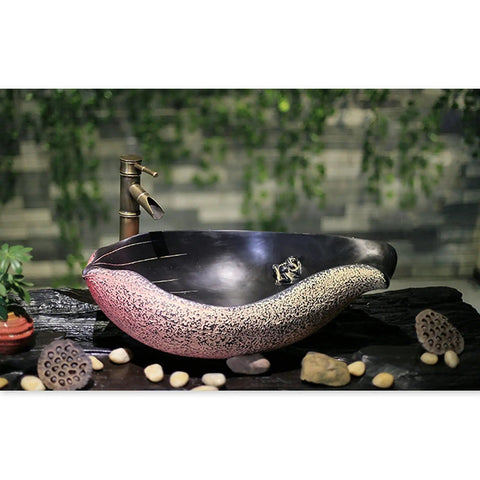 Bathroom Vessel Sink Chinese Style Art Basin Above Counter Basin with faucet in elegant design on wooden surface.