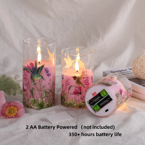 Pink Hummingbird Floral Glass Flameless Candles With Remote Timer Flickering Battery LED Pillar Candles Set Of 3 displayed on table
