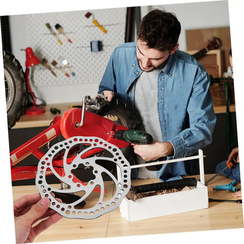 Premium Aluminum Mechanical Disc Brake Kit For Mountain Bikes With Dual Knob Calipers shown during installation on bike.
