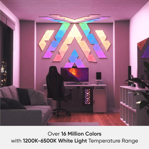 Gaming room setup with Shapes LED Wall Lights Kit With RGBW Panels, Sixteen Million Colors, mounted above a desk and chair
