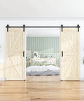 Antique Black Sliding Barn Door Hardware Kit With Double Track Roller System 6.6 Foot Length installed in interior room