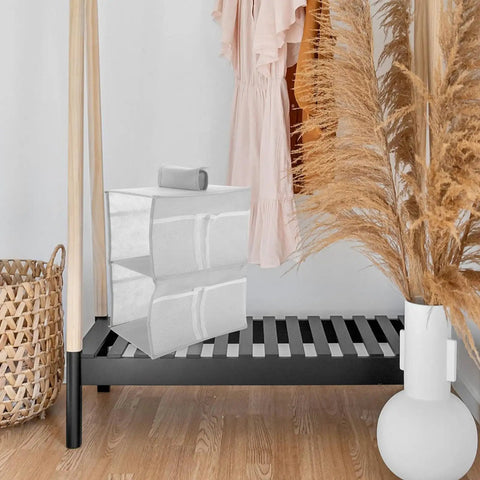 Layered Hanging Storage Bag Slick Nonwoven Closet Organizer With Roomy Pockets for storing toiletries and gadgets.