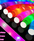 Glow Pop Tube Wand Toys For Kids And Toddlers Six Color Light Up Tubes in different modes on a dark background.