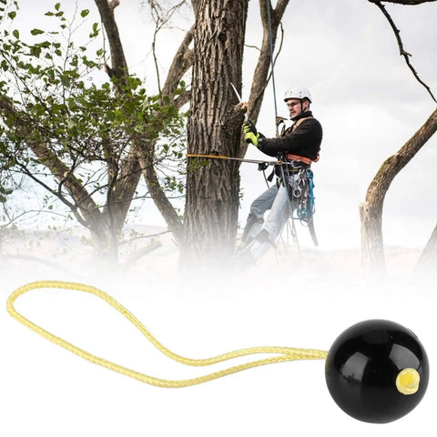Arborist using Arborist Retriever Ball Rope Friction Saver For Tree Work, Lightweight Plastic Climbing Ball With Rope Accessory.