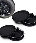 Upscale Black ABS Wheel Center Caps 4 Pack Snap In Rim Hub Covers For Trucks SUVs And Sedans OD 60MM ID 56MM shown with rim.