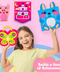 Girl holding butterfly tote from Kids Beginner Sewing Kit With Felt Projects For 5 And Up 8 Totally Easy DIY Crafts.
