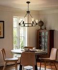 Dining room with Black Wagon Wheel Chandelier, 6-Light Rustic Modern Farmhouse Pendant for dining table over table, 23.6 inch