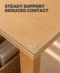 Rock Solid Clear Silicone Anti Slip Pads For Glass Tables And Desks With Zero Slide Grip and Protective Two Millimeter Cushion on wood table