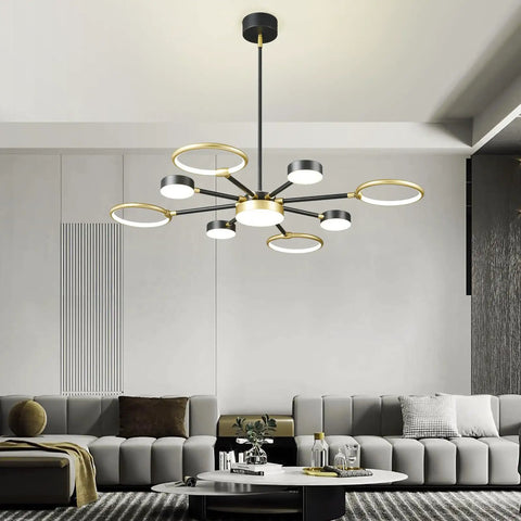 Modern Farmhouse Black And Gold LED Pendant Light 7 Light Sputnik Chandelier in a contemporary living room setting.