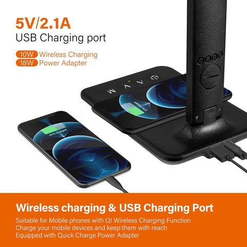 LED Desk Lamp With Wireless Charger And USB Port, charging two phones on sleek black base, modern design, close-up view.