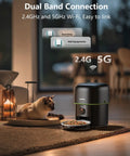 Zero Stress Fur Baby Snack Routine With This Smart Automatic Cat Feeder Boasting 1080P HD Camera And Infrared Night Vision Using 5G WiFi Plus Two Way Audio And Tight Portion Control To Keep Dry Kibble Fresh shows a cat near a black automatic feeder.