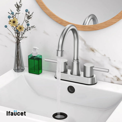 Brushed Nickel 4 Inch Centerset Bathroom Faucet With 2 Handles, Lead Free SUS304 Stainless Steel, Copper Pop Up Drain, 1.2 GPM Water Saving Aerator, No Splash, CEC Listed installed on a white bathroom sink with flowing water.