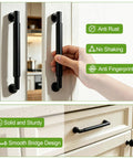 Ten Pack 5 Inch Matte Black Zinc Alloy Cabinet Handles And Drawer Pulls 128mm Hole Centers Durable Scratch Resistant Finish, hand using handle