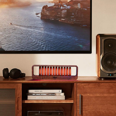 Music Sync LED Light With Spectrum Modes For Desk Use in walnut wood finish, placed on a wooden shelf, glowing in ambient light.