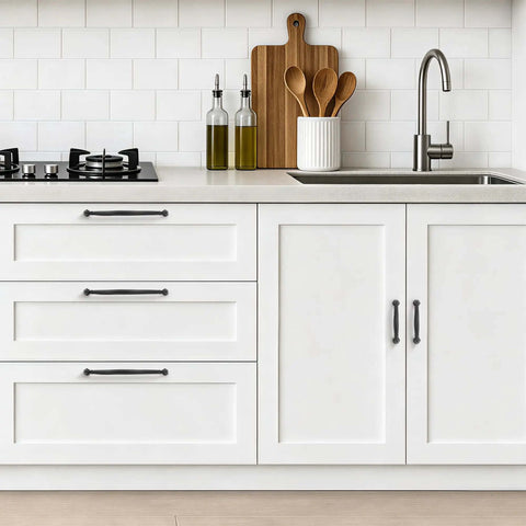 Freshen Up Your Space With Matte Black Zinc Cabinet Handles Rock Solid Heavy Duty Kitchen Pulls on modern white cabinetry.