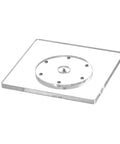 Slick Square Acrylic Cookie Decorating Turntable With Anti Slip Silicone Mat Easy Peasy Setup Kitchen Gamechanger Crystal Clear Lazy Susan Platter For Frosting Cupcakes, clear acrylic turntable viewed from above.