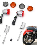 Pair of chrome bullet turn signal lamps with red lenses for Harley Sportster; mounting bolts included.