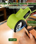 Heavy Duty Cordless Electric Scissors 4v Rechargeable Rotary Cutter With Self Sharpening Blades For Cardboard Fabric Leather Plastic Carpet Cutting Multipurpose Tool LED Safety Lock cutting through leather with LED light on.