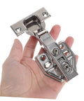 Person holding Stainless Steel Hidden Door Hinge With Soft Close Mechanism For Kitchen And Bathroom Cabinets Built To Last Durable Material Easy Installation And Smooth Damping By HOMSFOU