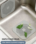 Heavy Duty Two Pack Square Hair Drain Catcher And Tub Filter With Grip Tight Suction Pads To Keep Your Shower Bathtub And Kitchen Sink Totally Clear Grey in a kitchen sink filtering debris.