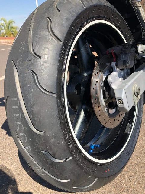 Motorcycle wheel with Angled Valve Stem Set With Pre Applied Threadlocker Nut Forged Aluminum Construction 0.357 Inch (8.3mm) Size Blue Finish Easy Inflation And Tire Pressure Check 2 Pack Fits Standard Rim Openings installed