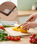 Non Slip Cutting Board Feet Set 8 Pack 1.6 Inch Self Adhesive Silicone Pads shown stabilizing wooden cutting board with vegetables