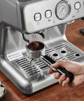Semi Automatic Espresso Machine With Built In Conical Burr Grinder, 30 Precision Grind Settings, 15 Bar Pump Pressure, Integrated Milk Frother, PID Temp Control Brews Like A Boss All Day Long, showing coffee grounds in portafilter.