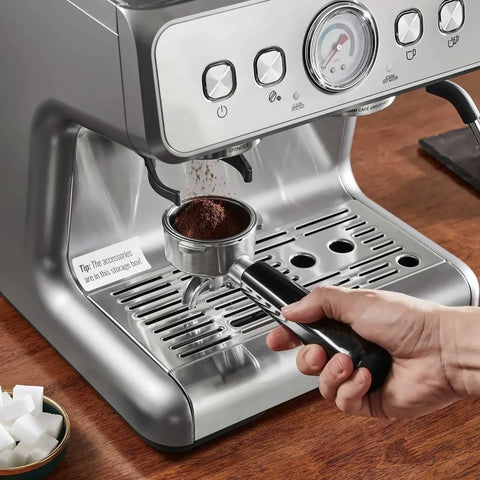 Semi Automatic Espresso Machine With Built In Conical Burr Grinder, 30 Precision Grind Settings, 15 Bar Pump Pressure, Integrated Milk Frother, PID Temp Control Brews Like A Boss All Day Long, showing coffee grounds in portafilter.