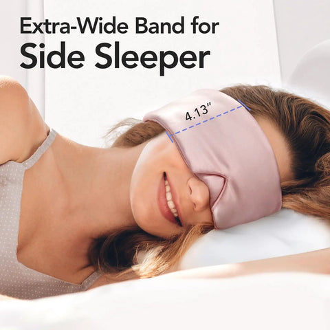 Woman using 100 Percent Mulberry Silk Sleep Mask For Women Adjustable Comfort Side Sleeper Friendly Full Blackout Eye Cover For All Night Sleep Travel Office Or Naps Pink, with extra-wide band, sleeping on side.