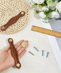 Knockout Coconut Brown Fibre Leather Cabinet Pulls 2 Pack Slick Drawer Handles For Kitchen Bathroom Furniture Upgrades 5 3 Inch Long in hand with coin.
