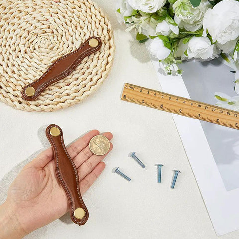 Knockout Coconut Brown Fibre Leather Cabinet Pulls 2 Pack Slick Drawer Handles For Kitchen Bathroom Furniture Upgrades 5 3 Inch Long in hand with coin.