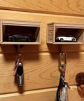 Two Pack Car Garage Key Holder With Opening Door, Adhesive Wall Mount Key Rack Organizer on wood wall