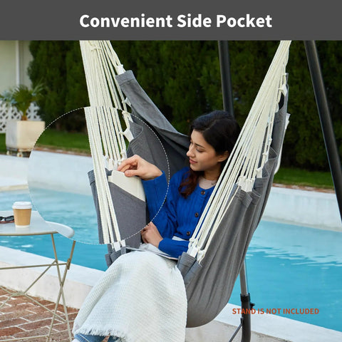 Person relaxing in Heavy Duty Hanging Hammock Chair Swing With Footrest For Outdoor Patio Porch Lounge Up To 500 Lbs