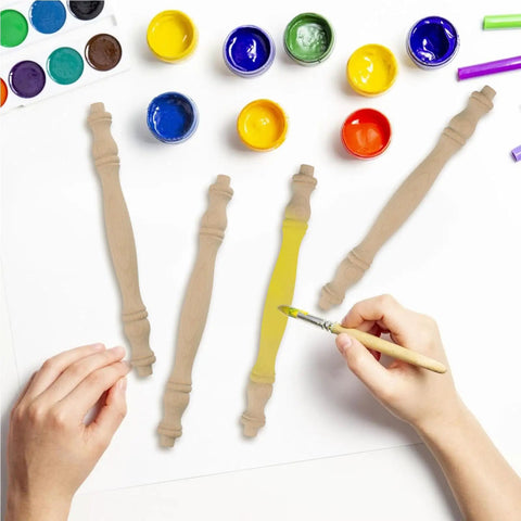 Solid Unpainted Wood Spindles Set Of Six Straight Up Smooth Finish Unfinished Balusters for Dope DIY Crafts with yellow paint.