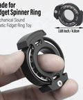 Person holding Aluminum Alloy Fidget Ring For Men Dope Anxiety Relief Toy With 6804 Ball Bearing Chain Bike Sound Nuclear Reactor Design