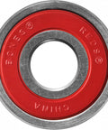 Bones Reds skateboard bearing with red seal and metal outer race, front view