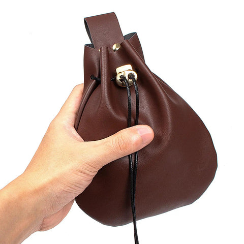 Hand holding a Badass Brown Leather Belt Pouch For Medieval Renaissance And Viking Larp Cosplay, showing drawstring closure.