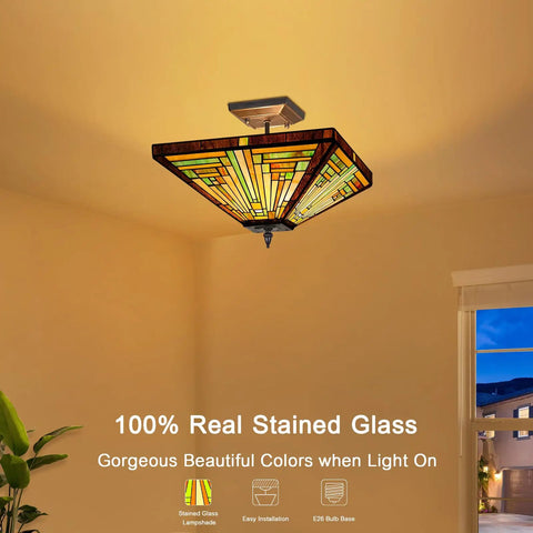 Tiffany Style Stained Glass Ceiling Lamp 2 Light 14 Inch Wide Amber Brown Semi Flush Mount glowing warmly in a room.
