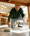 Man applying Epic High Gloss Colored Epoxy Garage Floor Paint Kit With Durable Concrete Sealer For Marble Texture Finish.