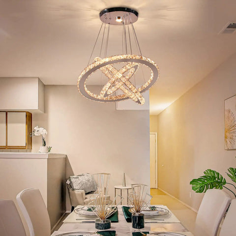 Dope Modern Crystal Ring Chandeliers LED Pendant Light With Adjustable Height And Ring Sizes 12, 16, 20 Inches glowing in dining room
