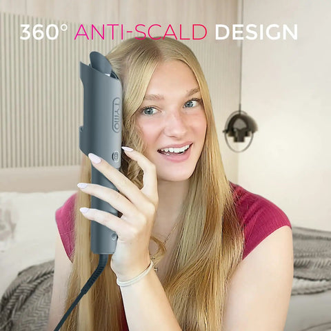 Woman using Automatic Rotating Curling Iron for Effortless Beachy Waves, CurlPRO Wand With Ionic Technology in home setting.