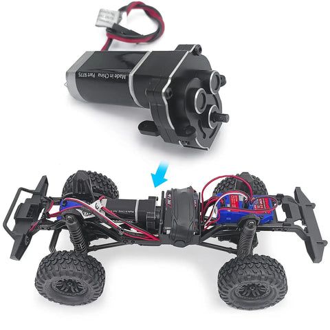 Aluminum Transmission Case For 1/18 TRX4M RC Crawler, 16.6 To 1 Gearbox, heavy duty alloy, shown with RC car chassis.